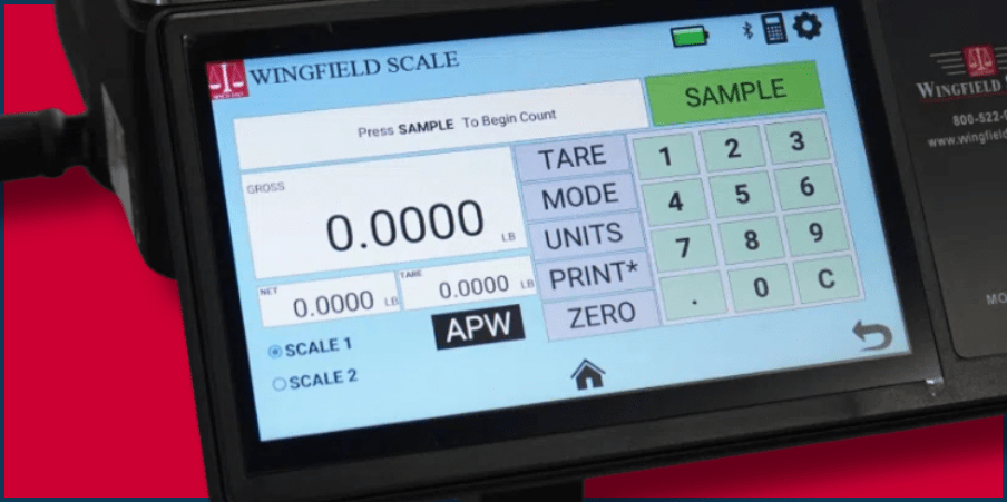 Touch screen scale with custom interface by Wingfield Scale, showcasing easy-to-use features such as tare, mode, units, and print options, designed to improve operational efficiency for clients like Olin