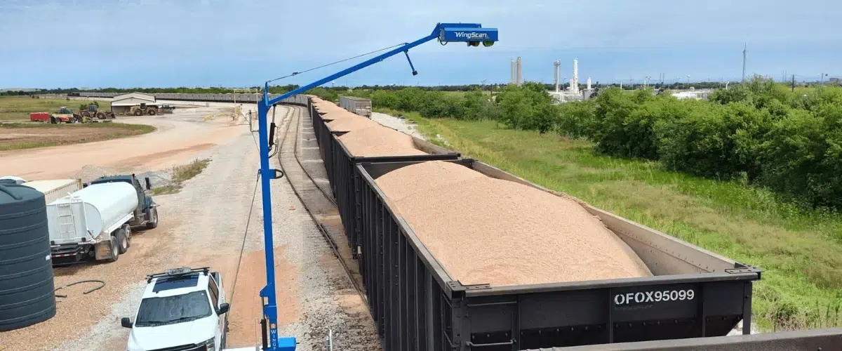 wingscan advanced lidar measuring a rail car hauling sand in a rugged environment