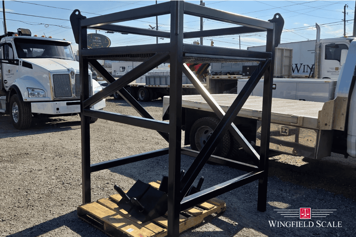 Custom-engineered steel tank scale support frame fabricated by Wingfield Scale for a U.S. Department of Energy facility, staged for shipment